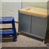 T06. Cabinet and stool. 